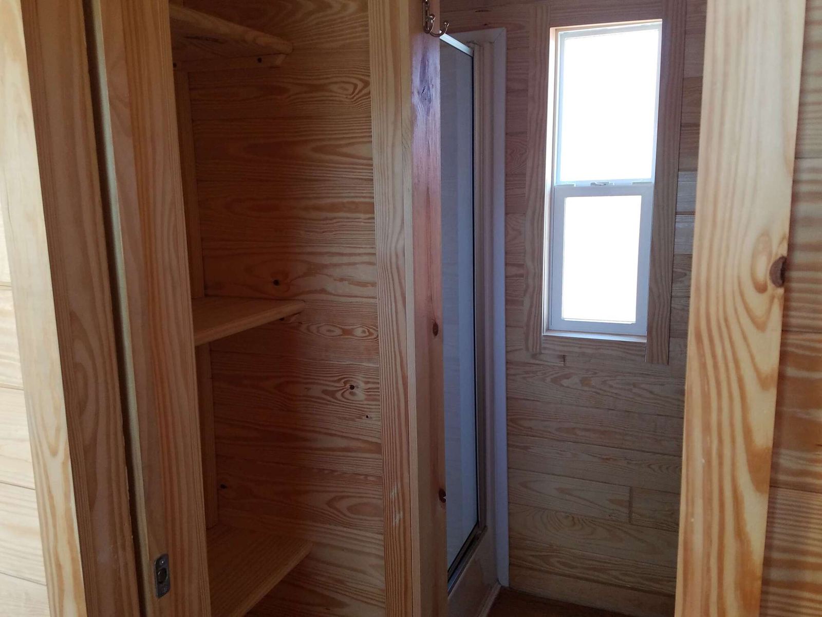 Hallway to bedrooms and bath